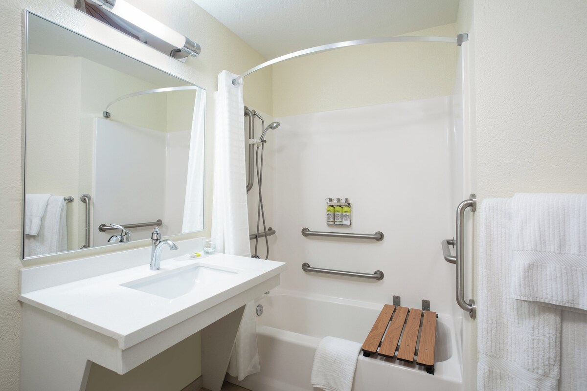 Suite, 1 Bedroom | Desk, laptop workspace, blackout drapes, iron/ironing board