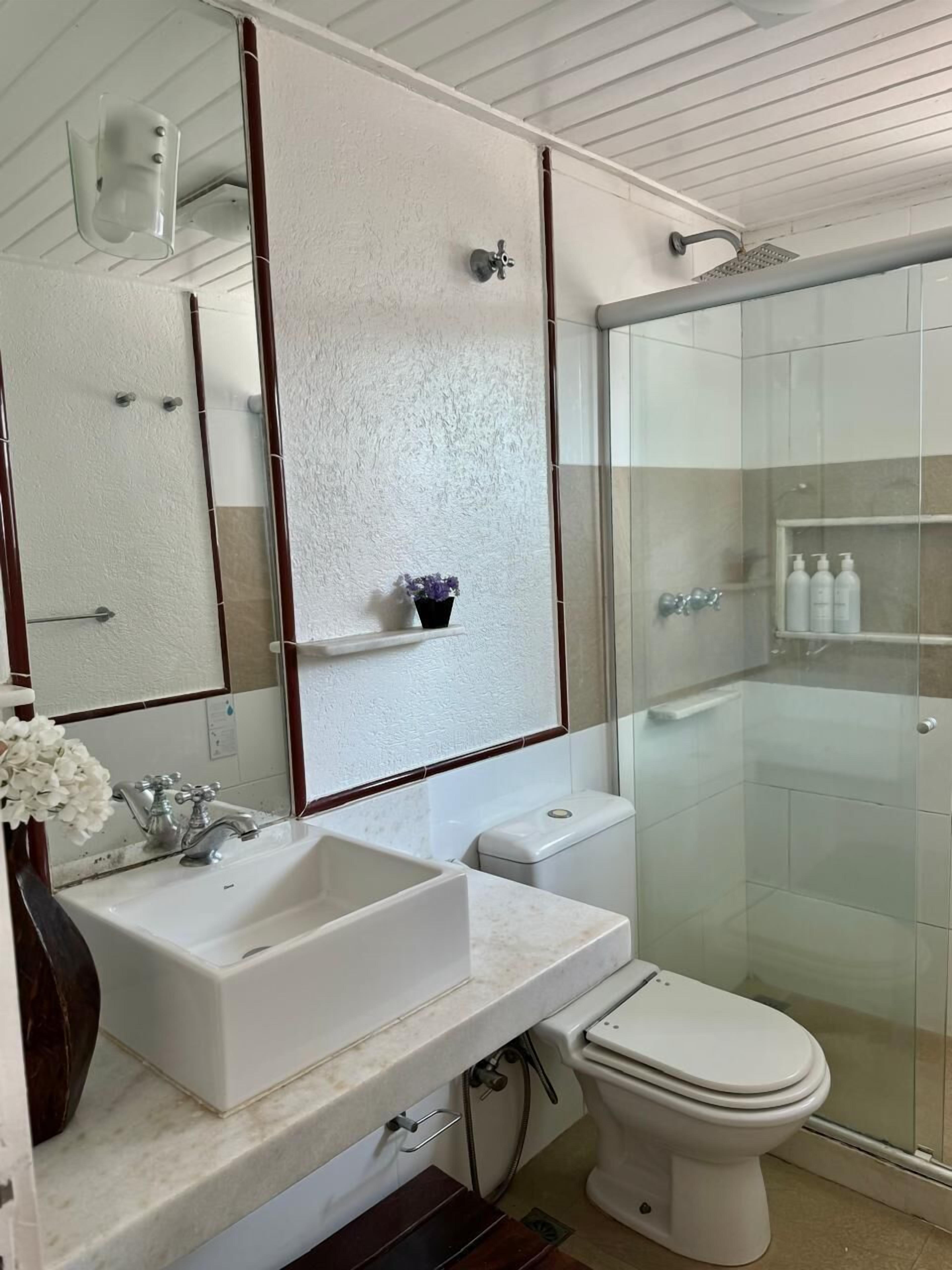 superior quadruple room | bathroom | shower, hair dryer, towels, soap