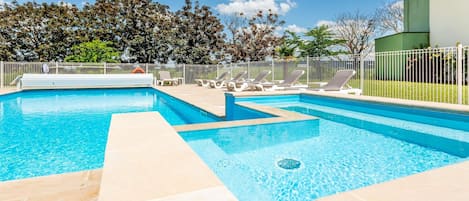 Seasonal outdoor pool, open 9:00 AM to 9:00 PM, sun loungers