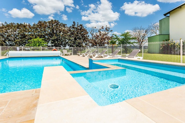 Seasonal outdoor pool, open 9:00 AM to 9:00 PM, sun loungers
