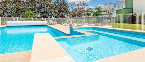 Seasonal outdoor pool, open 9:00 AM to 9:00 PM, sun loungers