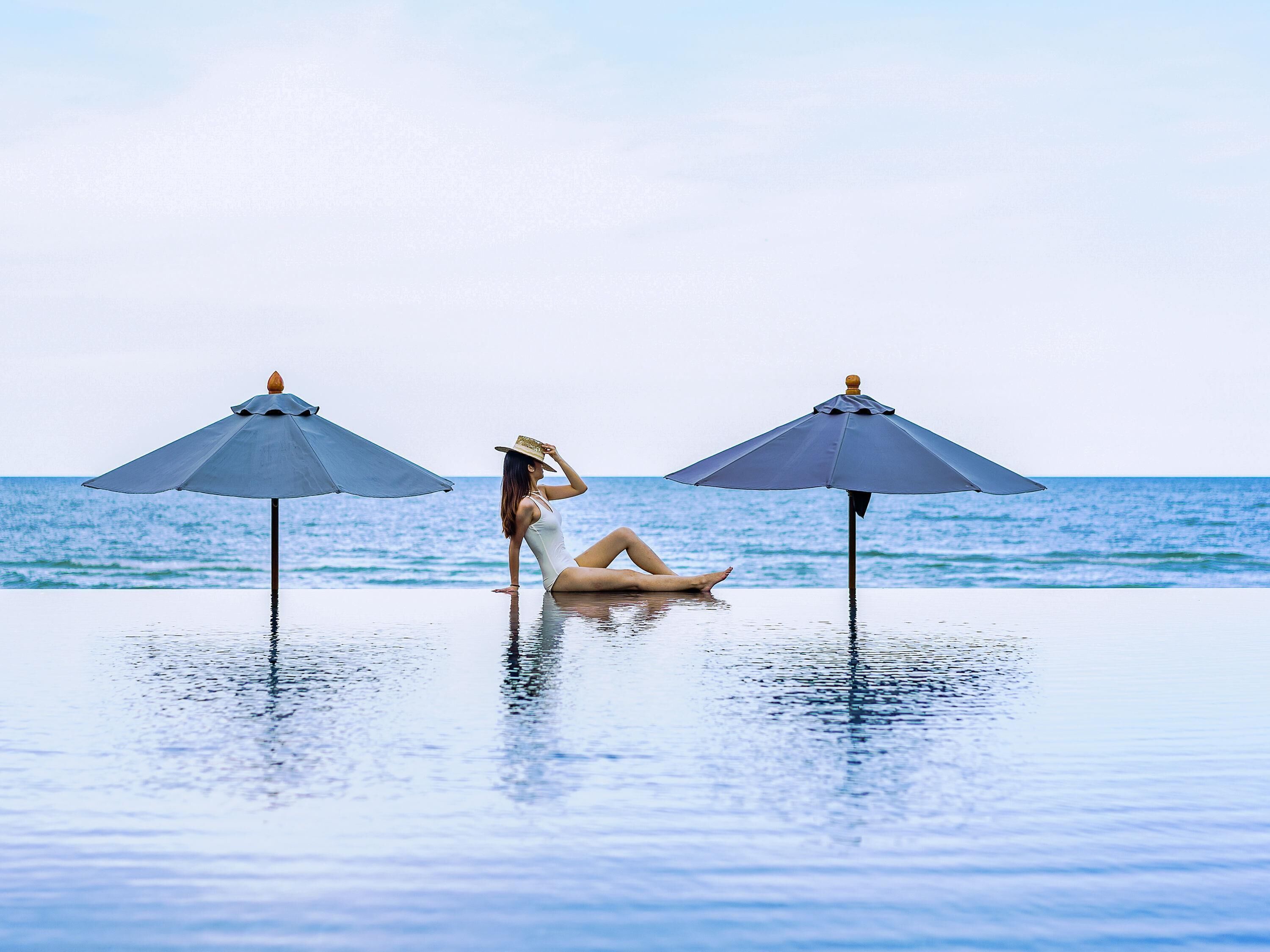Outdoor pool, pool umbrellas, pool loungers