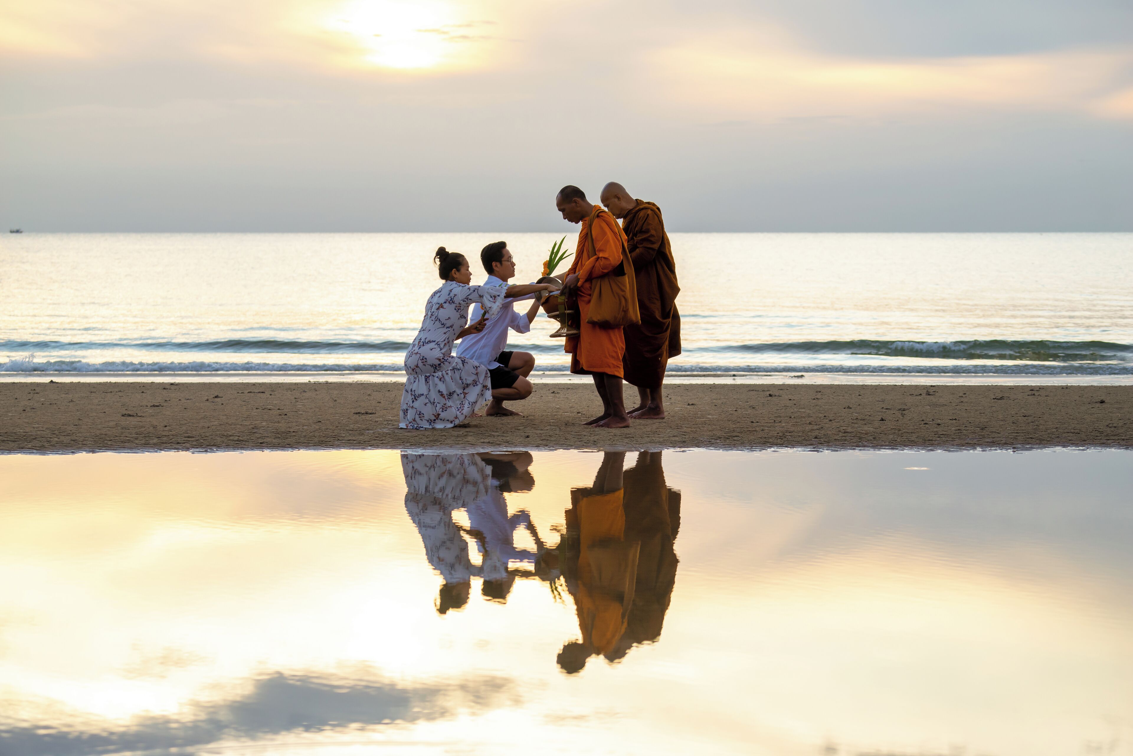 on the beach, sun-loungers, beach umbrellas, beach towels