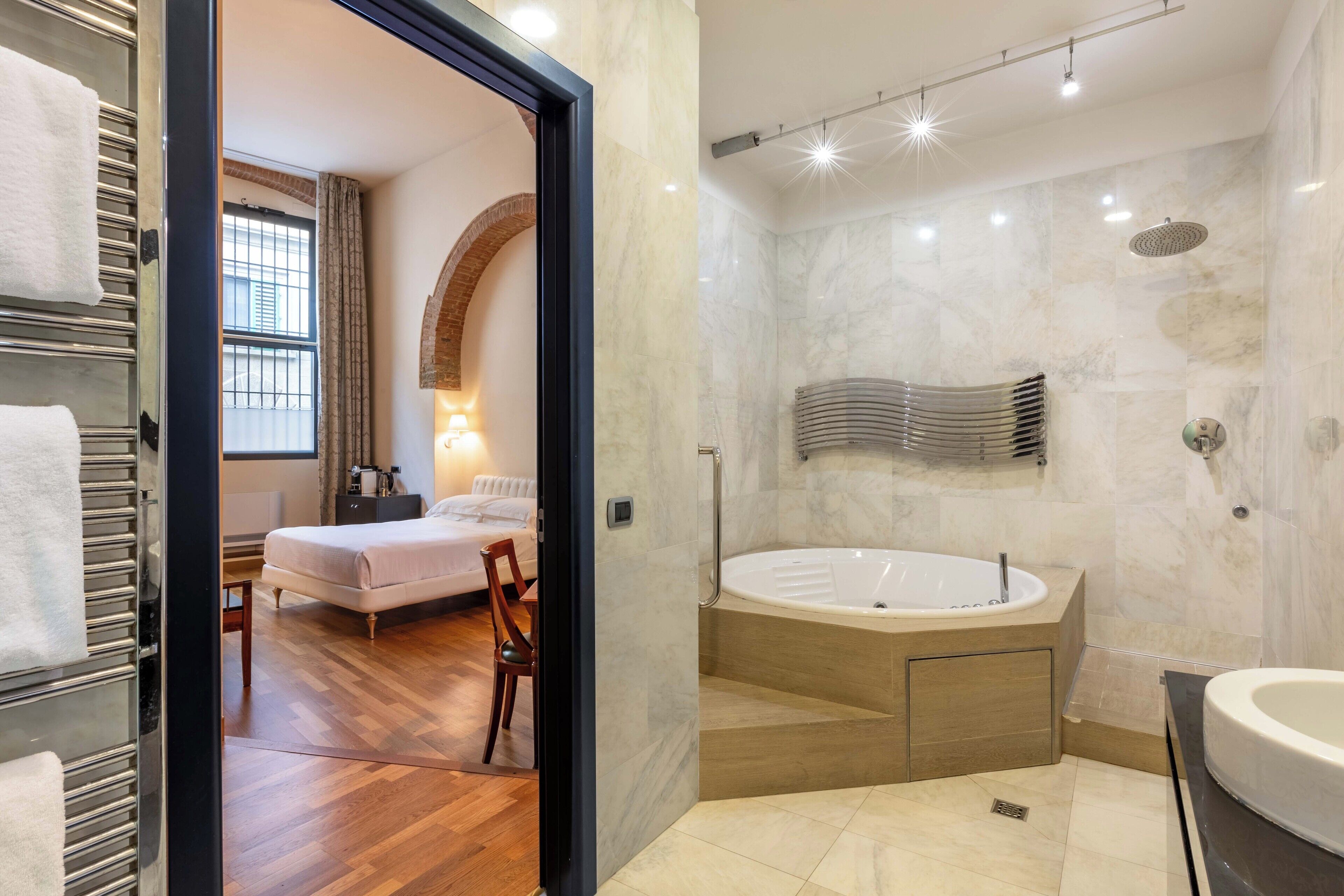 junior suite | bathroom | free toiletries, hair dryer, bathrobes, slippers