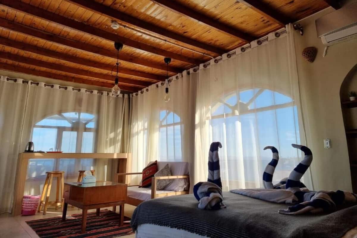 Panoramic Room | Minibar, in-room safe, desk, blackout drapes