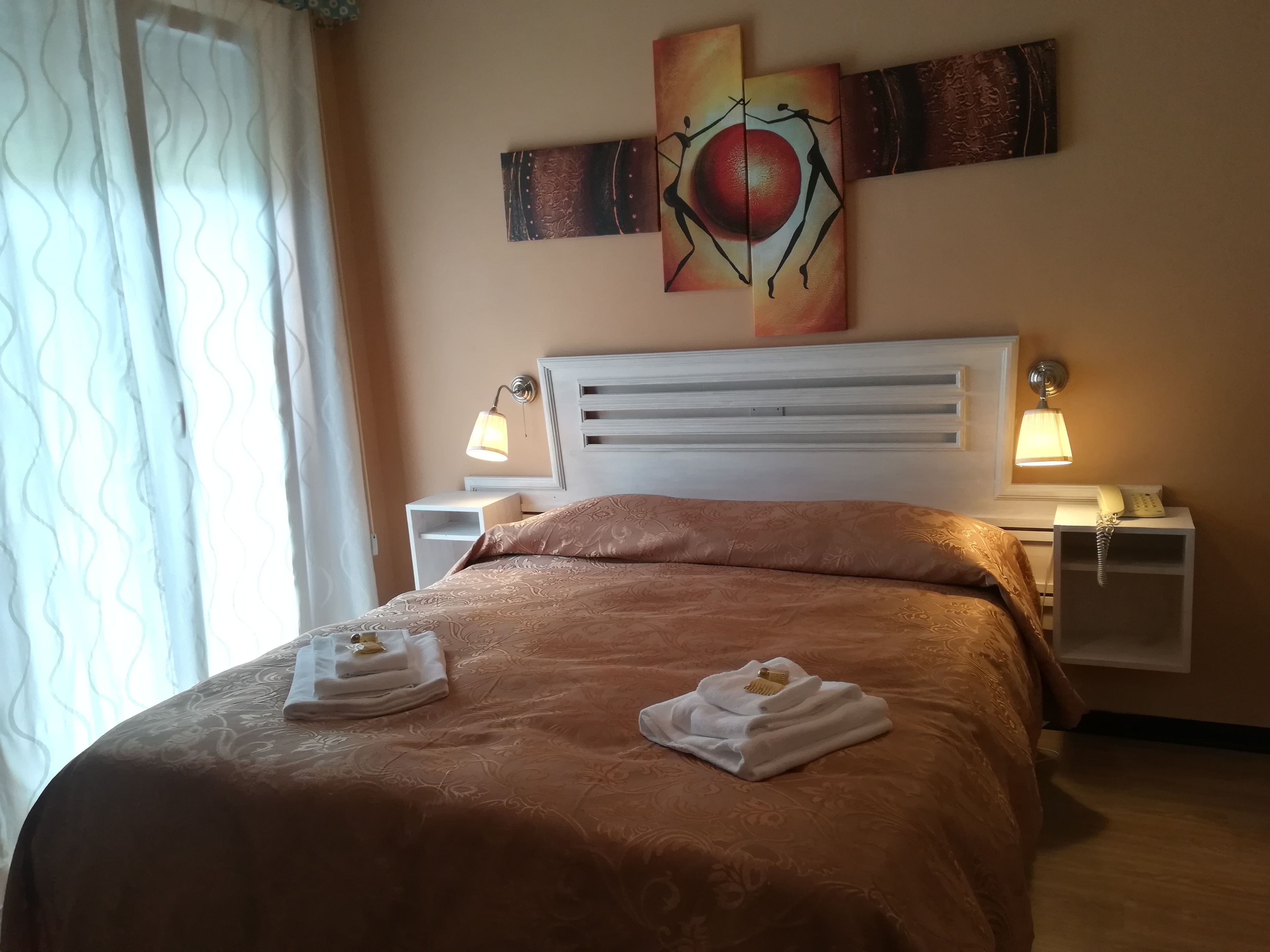 triple room | memory-foam beds, in-room safe, individually decorated, desk