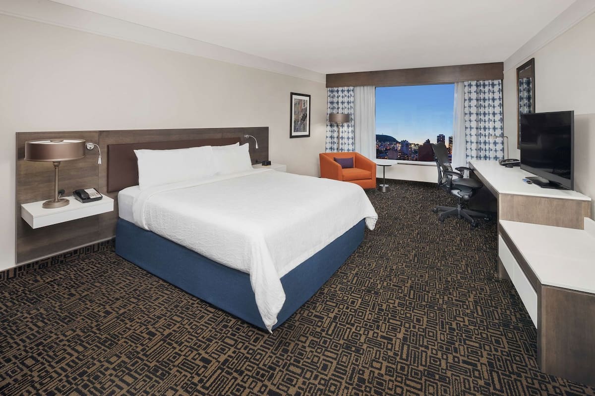Premium bedding, in-room safe, laptop workspace, soundproofing