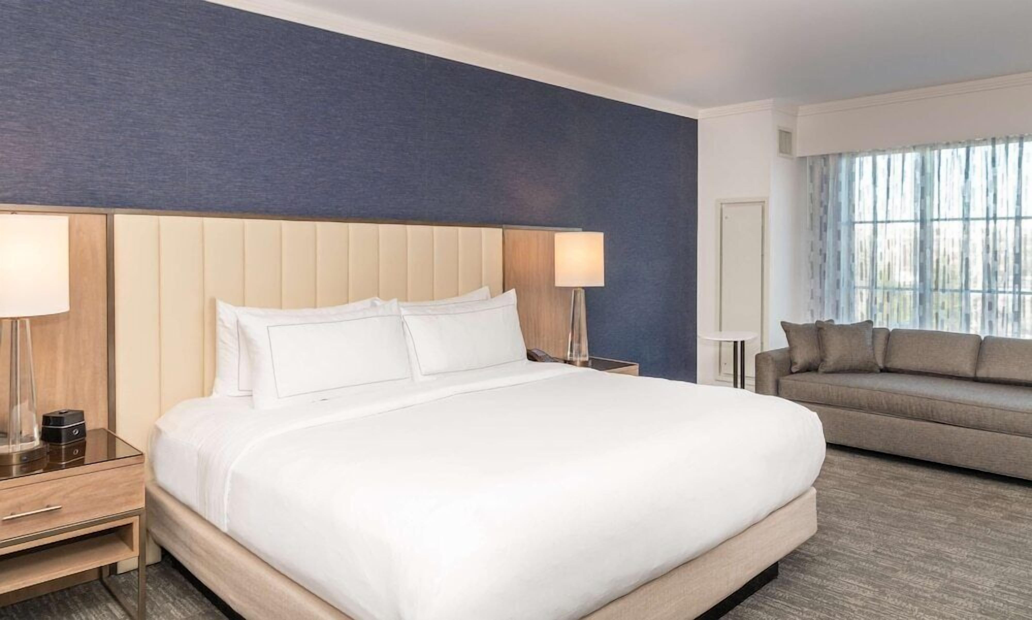 Premium bedding, pillow-top beds, in-room safe, desk