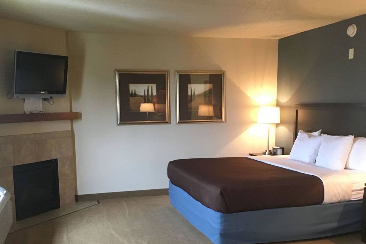 Desk, blackout curtains, soundproofing, iron/ironing board