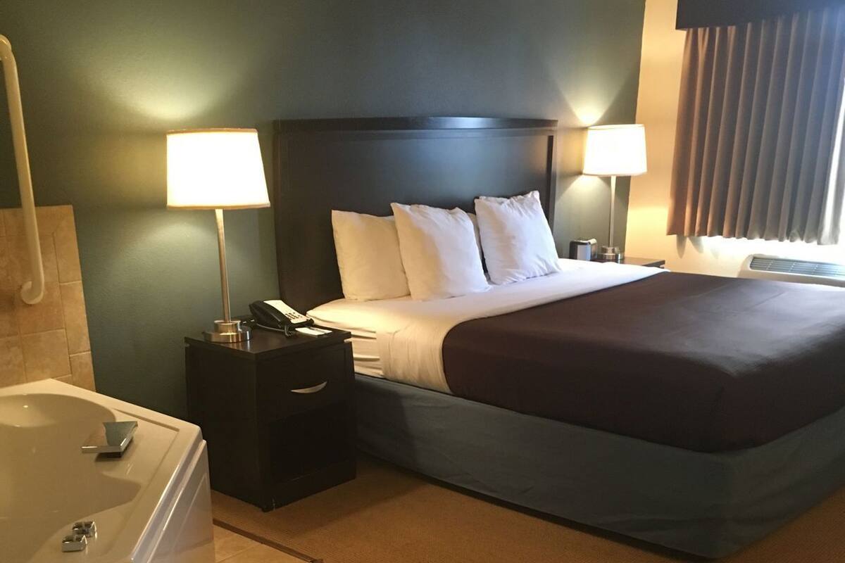 Desk, blackout curtains, soundproofing, iron/ironing board