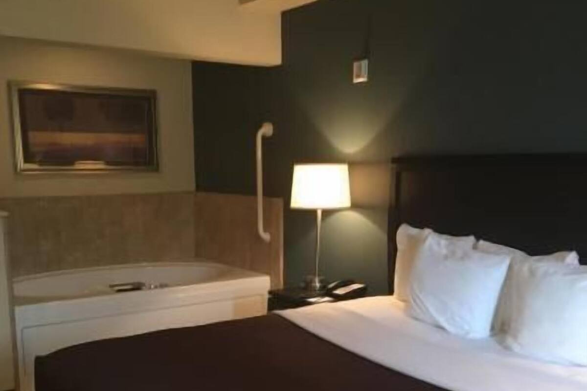 Desk, blackout curtains, soundproofing, iron/ironing board