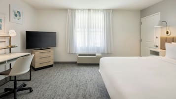 Studio, 1 King Bed (Mobility Accessible, Tub) | Desk, laptop workspace, iron/ironing board, free cribs/infant beds