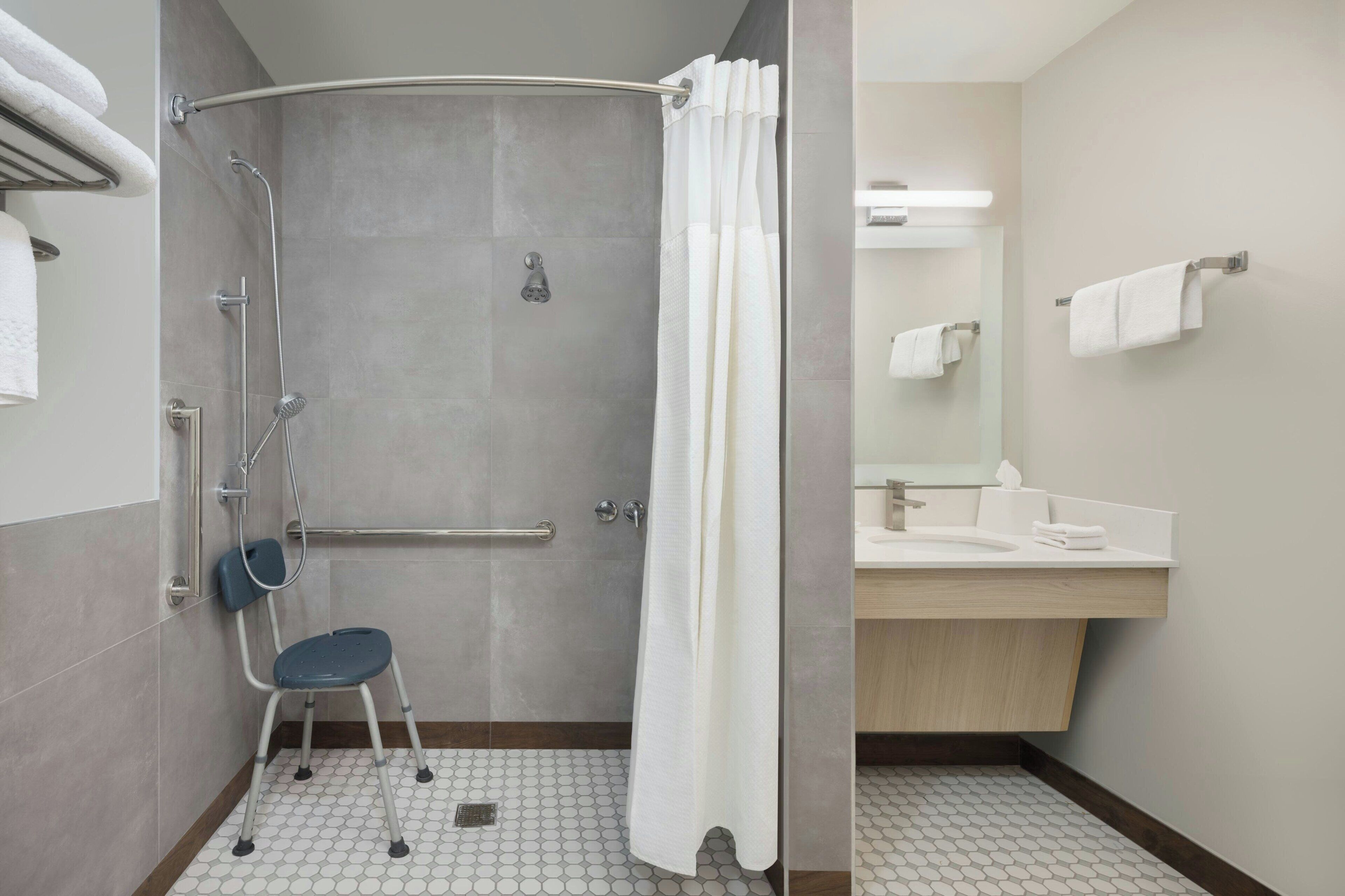 studio, 1 king bed (mobility accessible, tub) | bathroom | hair dryer, towels