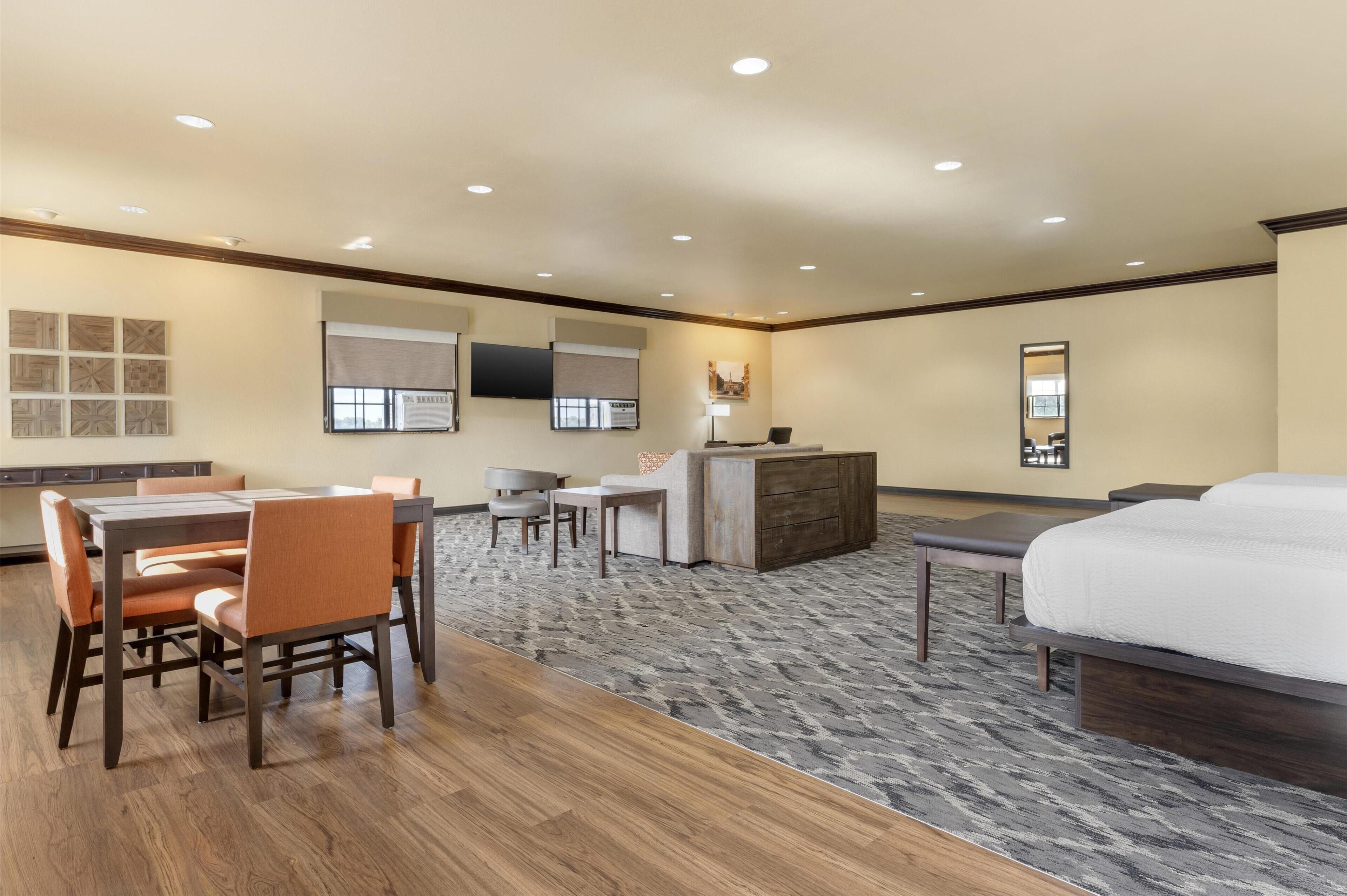 suite, 2 queen beds, non smoking, refrigerator & microwave (larger room;with sofabed) | 1 bedroom, in-room safe, desk, laptop workspace