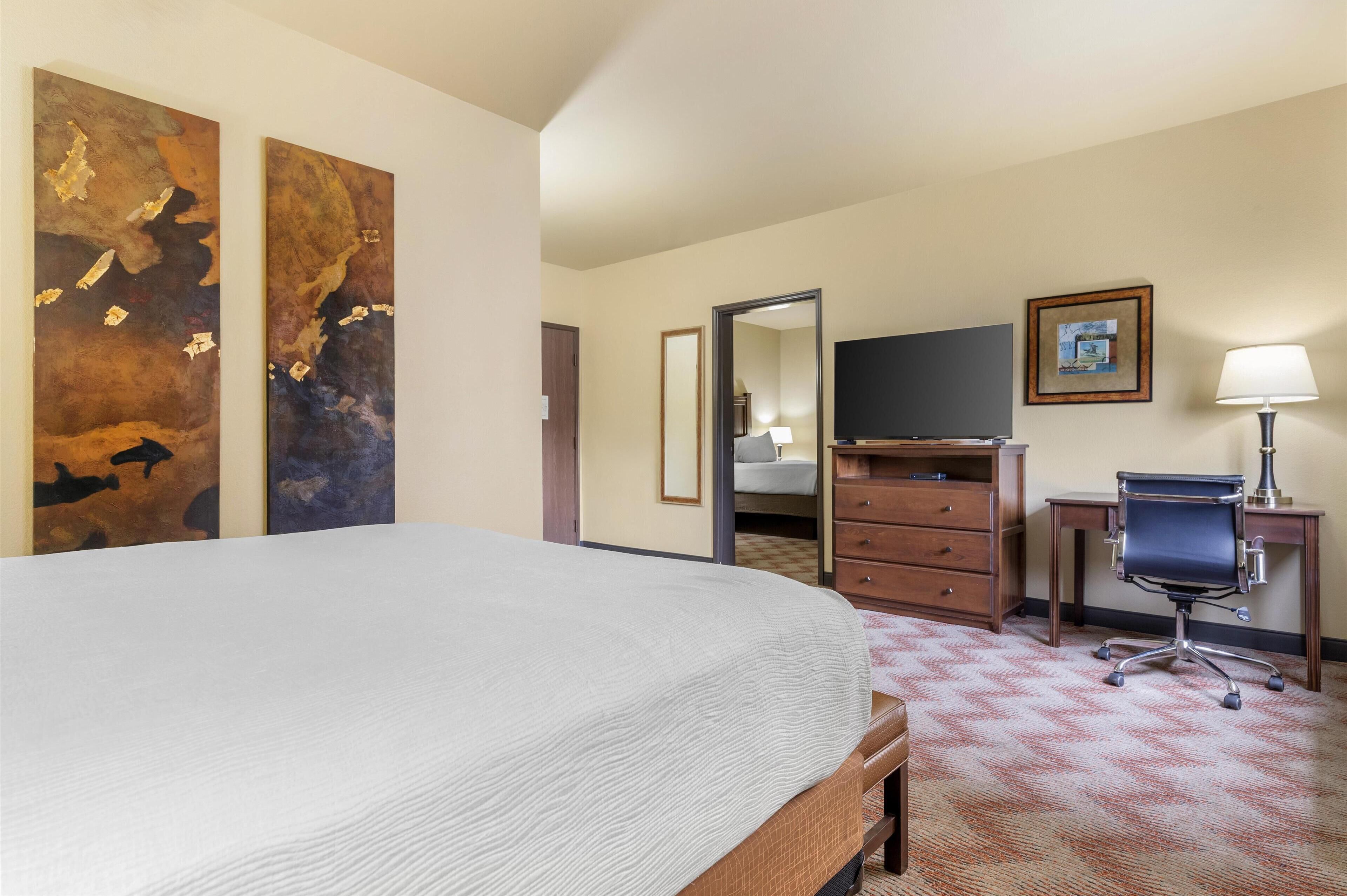 suite, 2 queen beds, non smoking, jetted tub | 1 bedroom, in-room safe, desk, laptop workspace