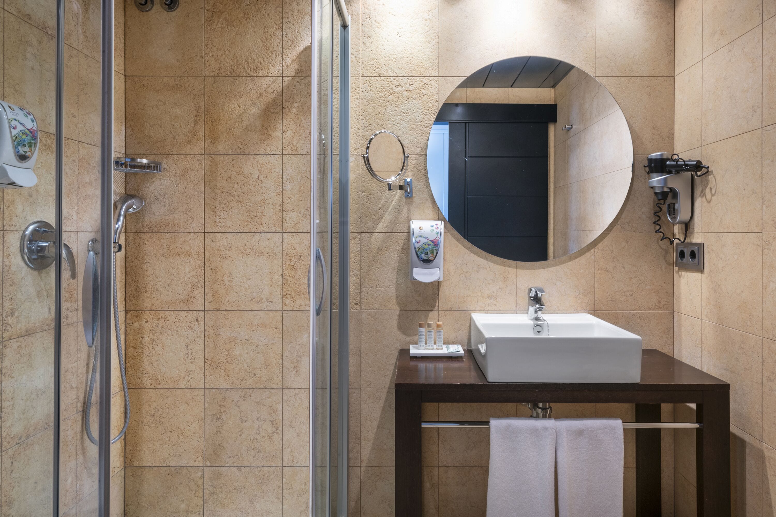 shower, free toiletries, hair dryer, towels