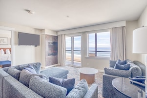 Suite (Bella) | Living area | 50-inch flat-screen TV with cable channels, TV, fireplace