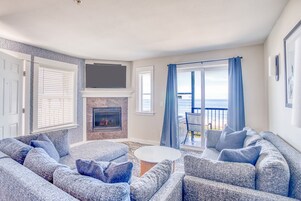 Suite (Pacific) | Living area | 50-inch flat-screen TV with cable channels, TV, fireplace