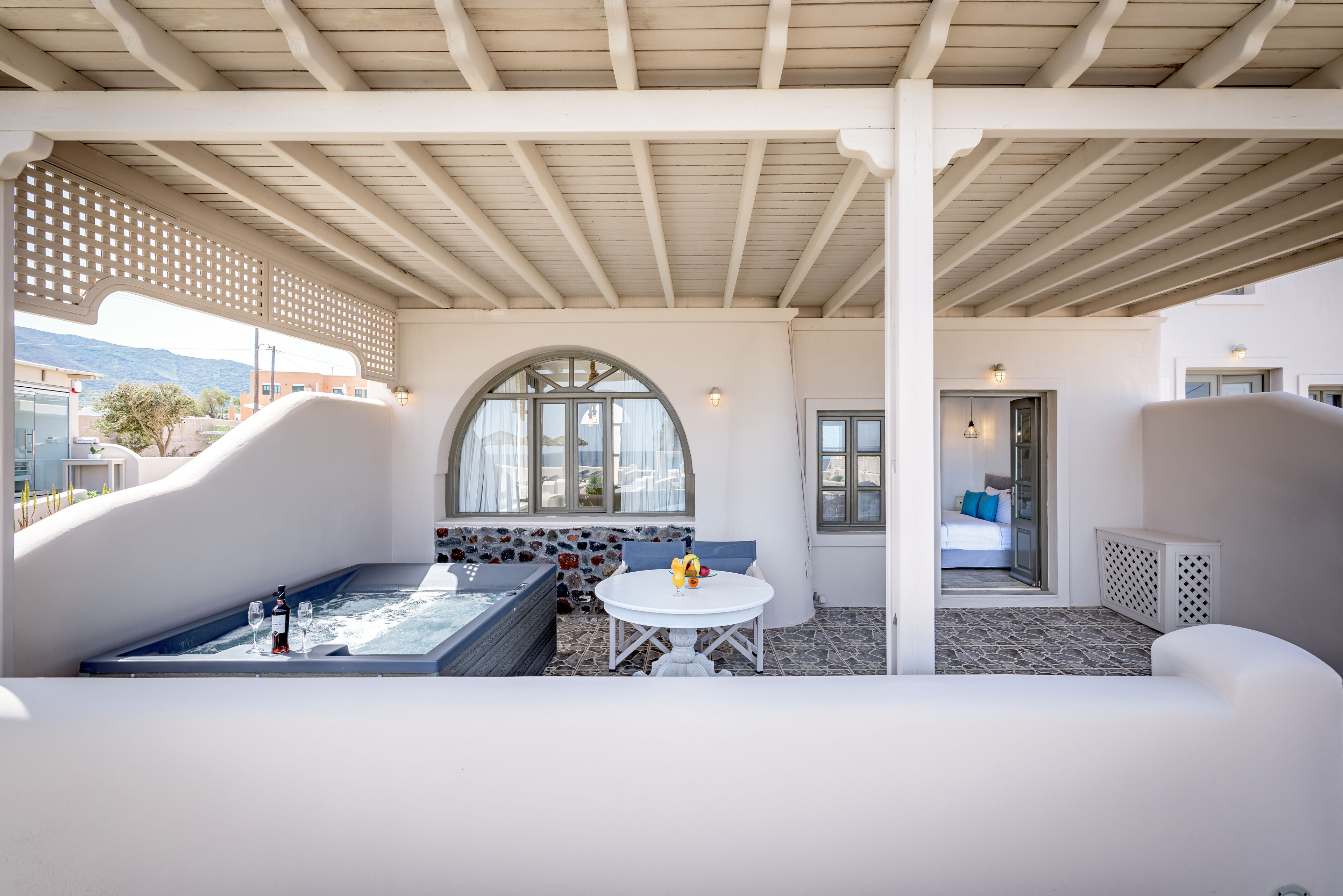 deluxe suite with outdoor hot tub, sea view | balcony