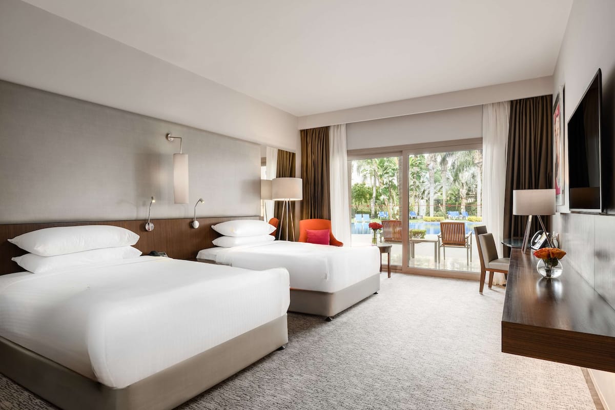 Deluxe 2 Doubles, High Floor, Balcony, Pool/Lake view | 1 bedroom, premium bedding, minibar, in-room safe
