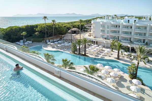 Indoor pool, seasonal outdoor pool, pool umbrellas, sun loungers