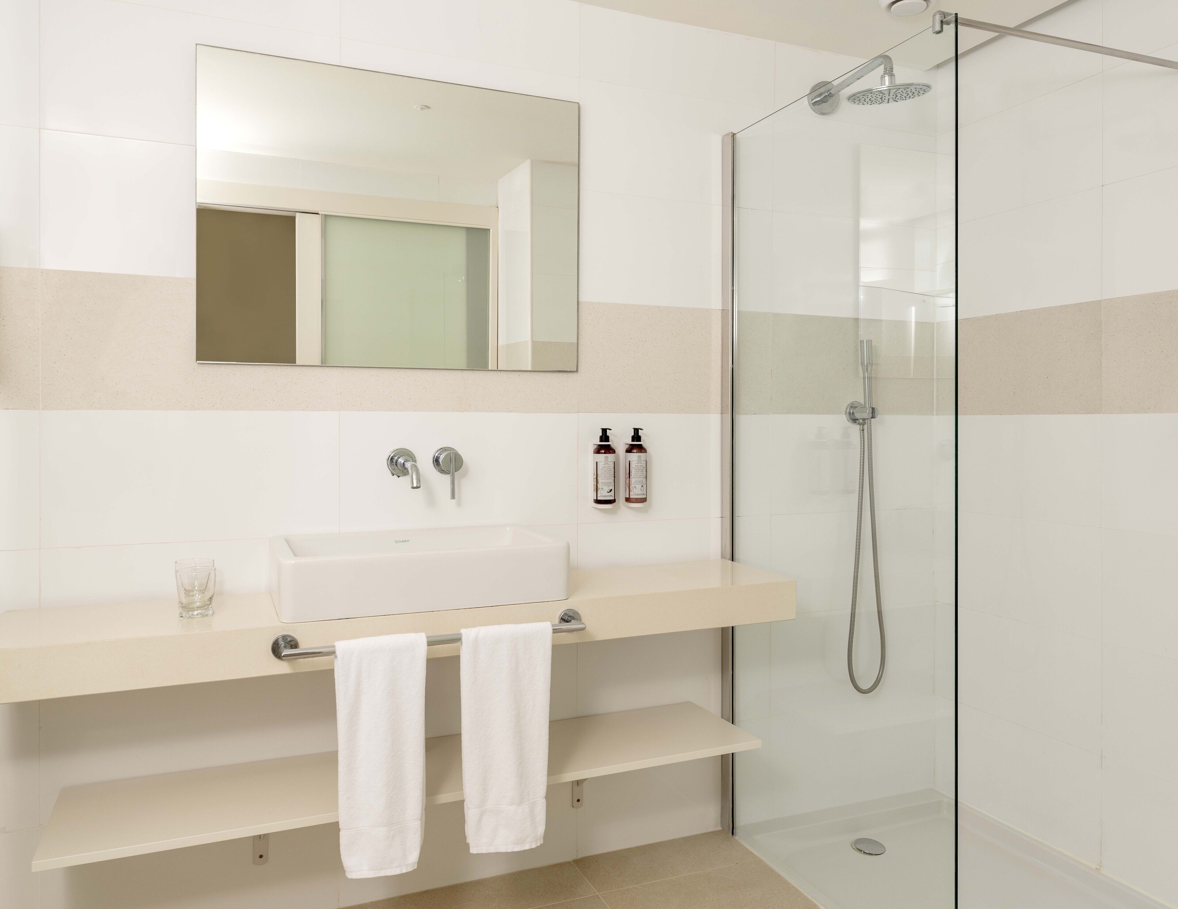 shower, eco-friendly toiletries, towels