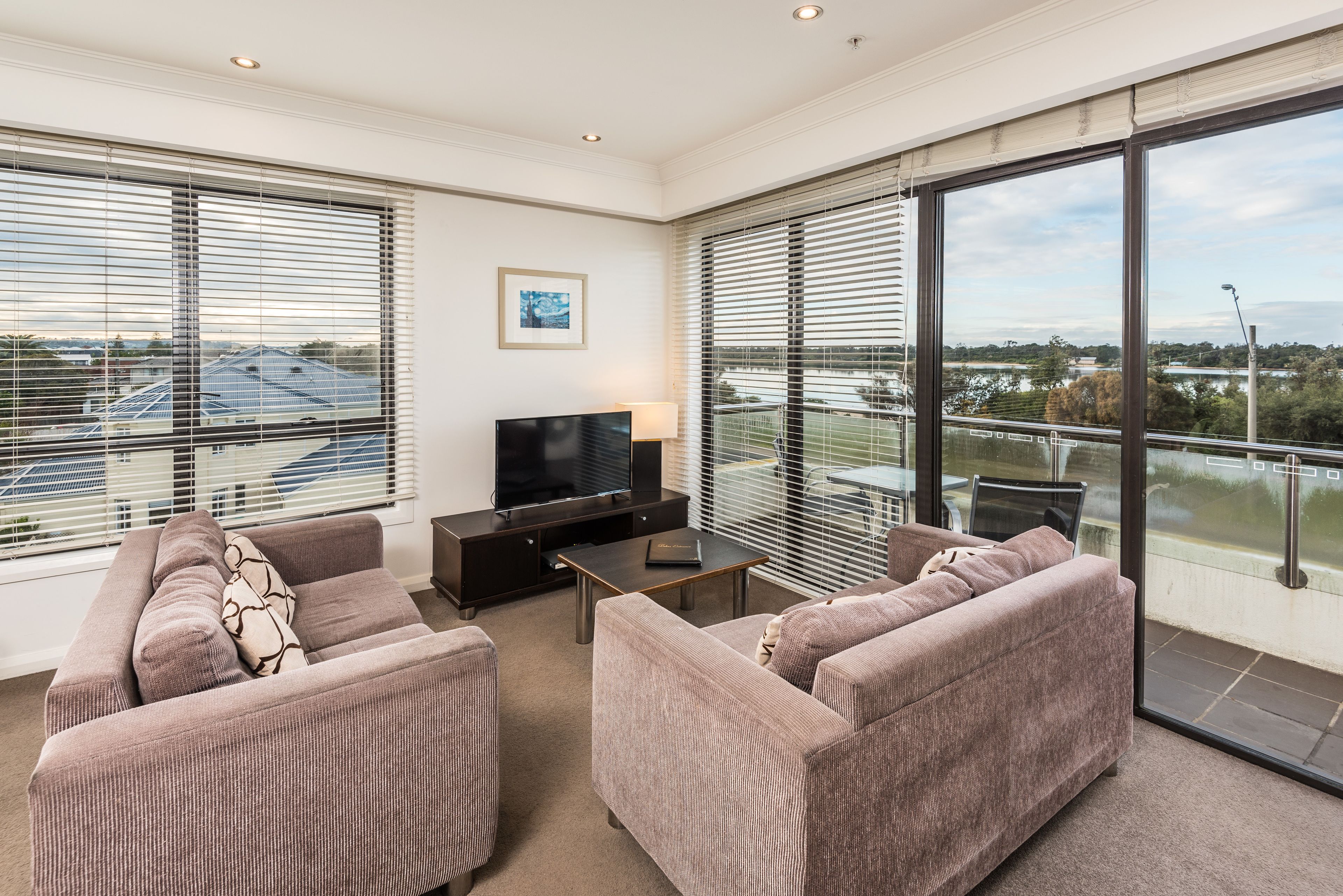 standard three bedroom apartment | living area | flat-screen tv