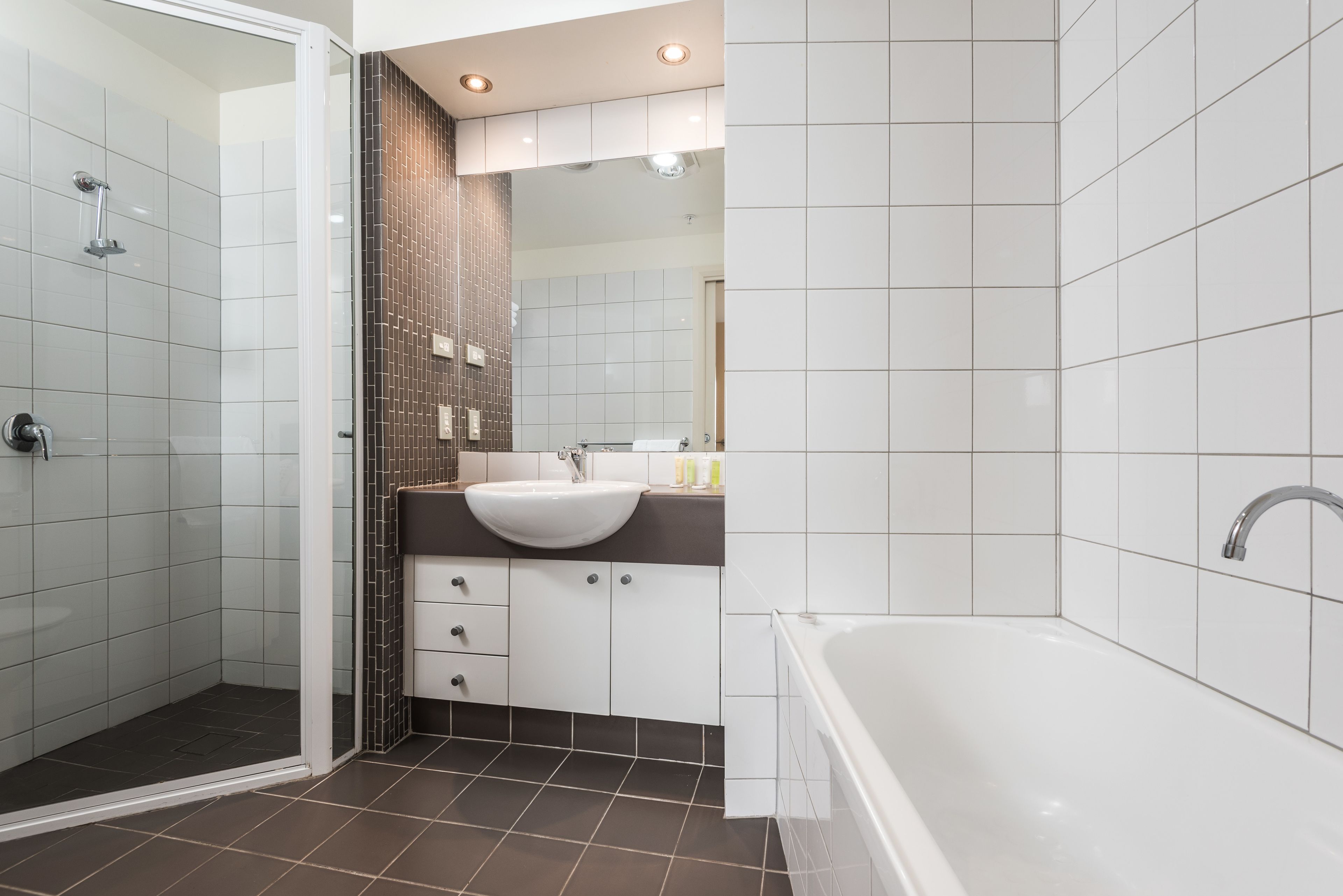 separate bathtub and shower, free toiletries, hair dryer, towels