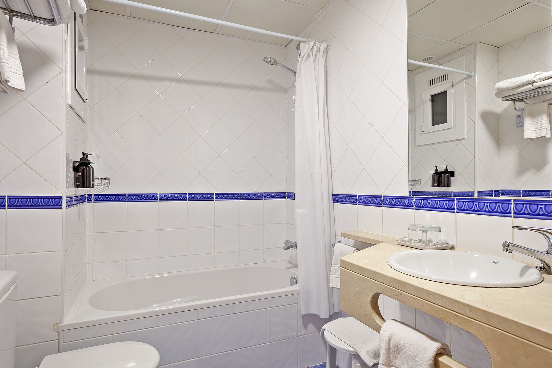 quadruple room | in-room safe, desk, blackout curtains, free cots/infant beds