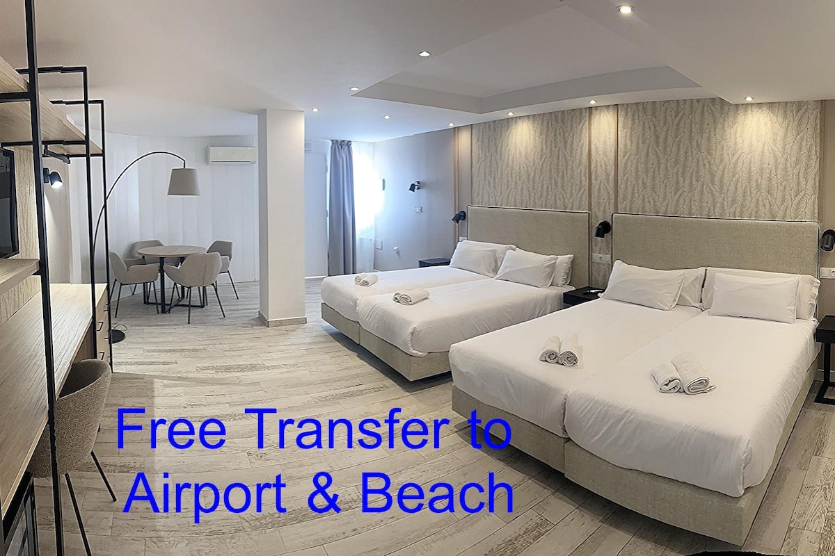 Deluxe Quadruple Room with Free Airport Shuttle | Minibar, in-room safe, individually decorated, individually furnished