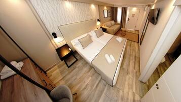 Couette en duvet d'oie, minibar, coffres-forts dans les chambres