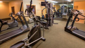 A fitness center with treadmills, elliptical machines, and weight equipment. - Candlewood Suites Knoxville Airport-Alcoa by IHG (Alcoa)