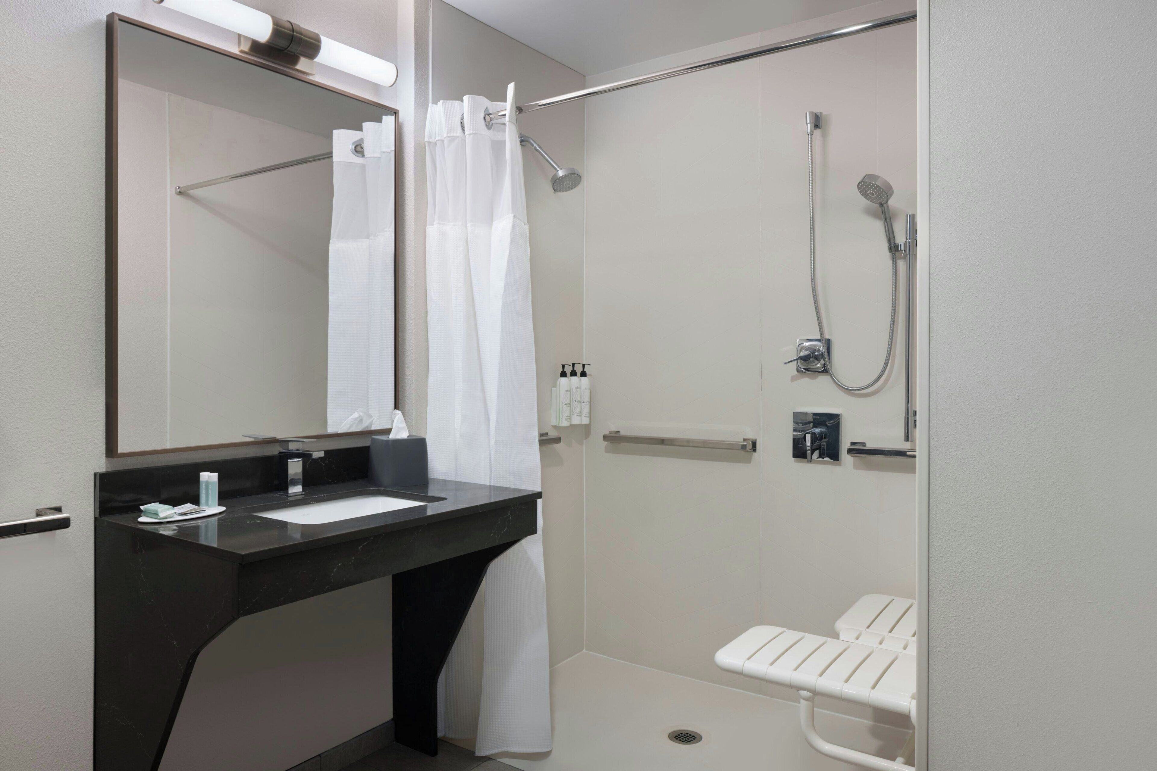 combined shower/bathtub, free toiletries, hair dryer, towels