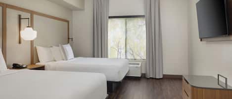 Premium bedding, pillow-top beds, desk, iron/ironing board