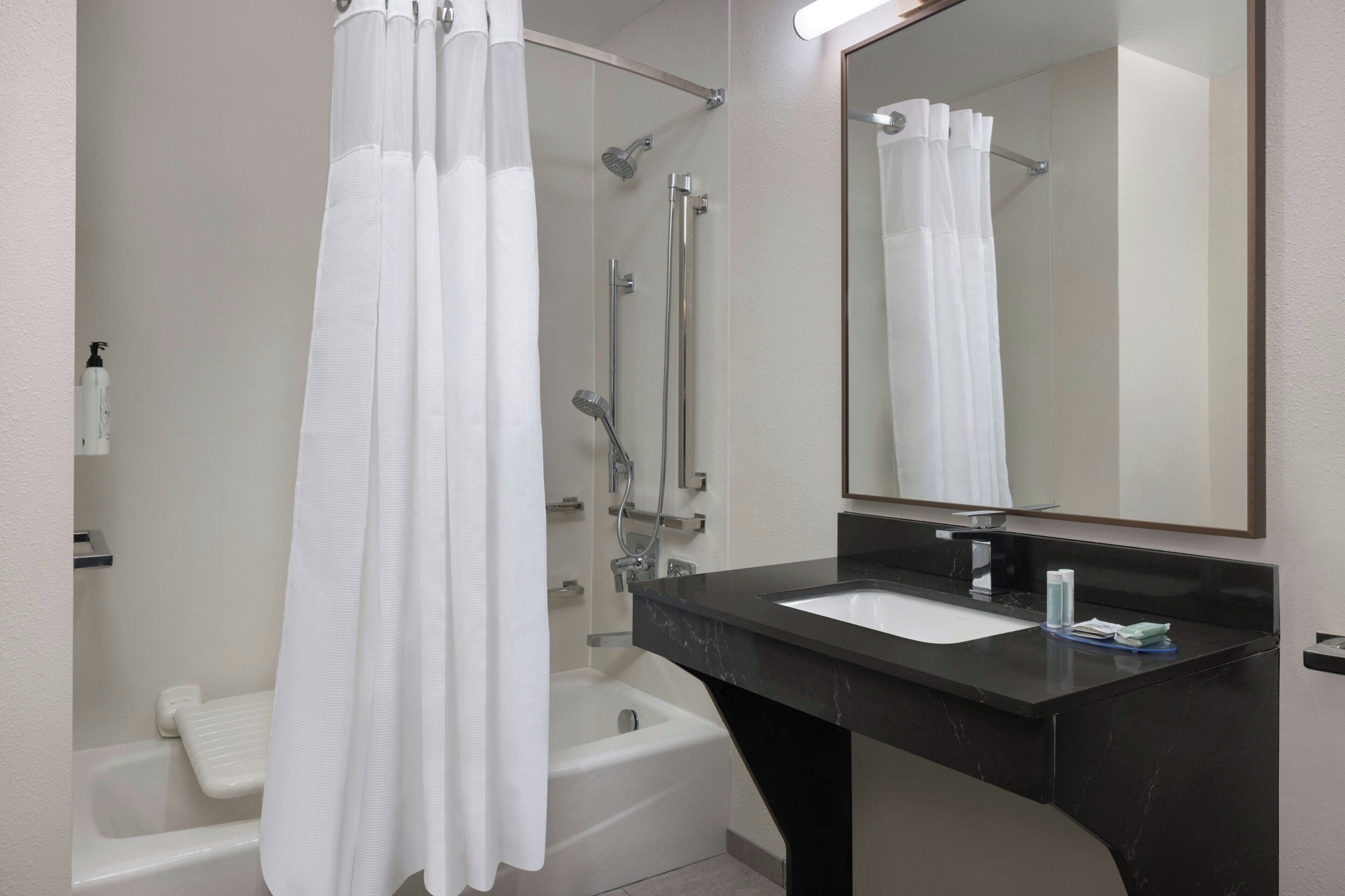 combined shower/bathtub, free toiletries, hair dryer, towels