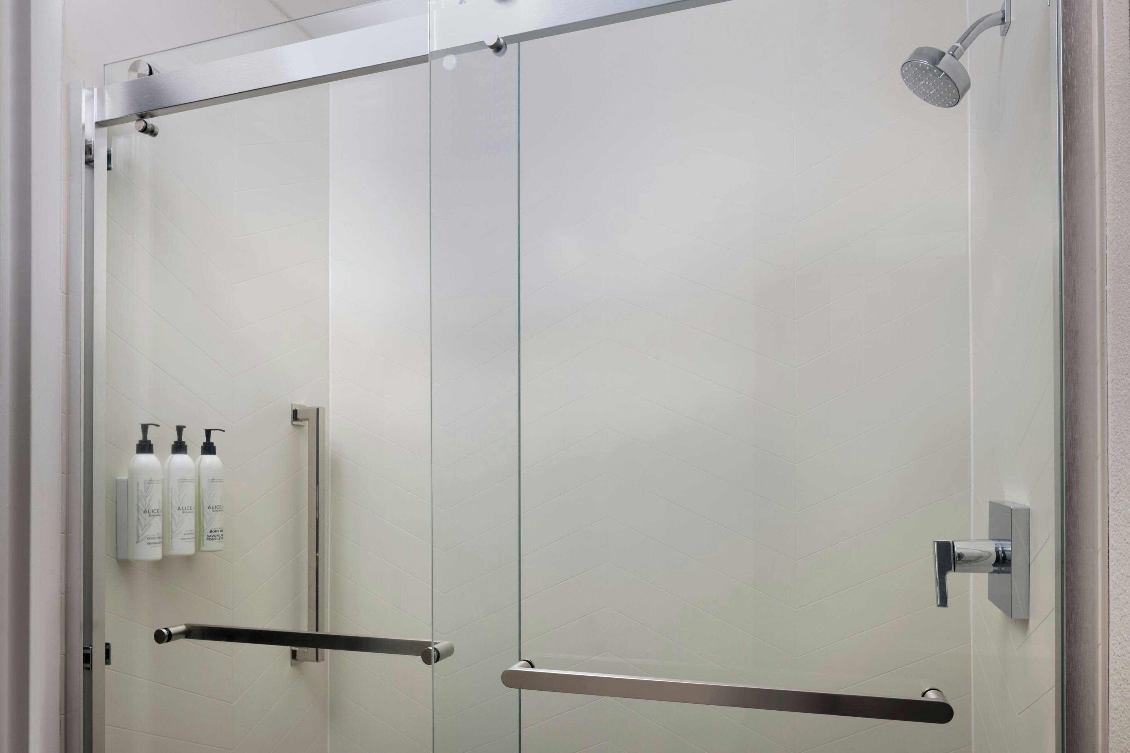 combined shower/bathtub, free toiletries, hair dryer, towels