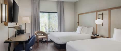 Ropa de cama de alta calidad, camas con pillow-top y escritorio