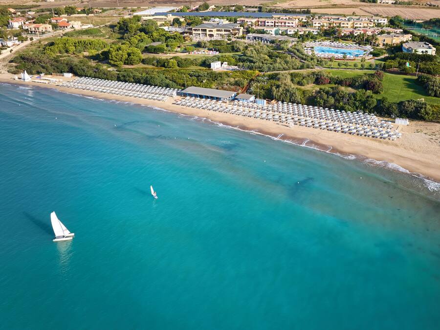 Private beach, sun-loungers, beach umbrellas, windsurfing