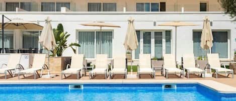 Outdoor pool, pool umbrellas, pool loungers