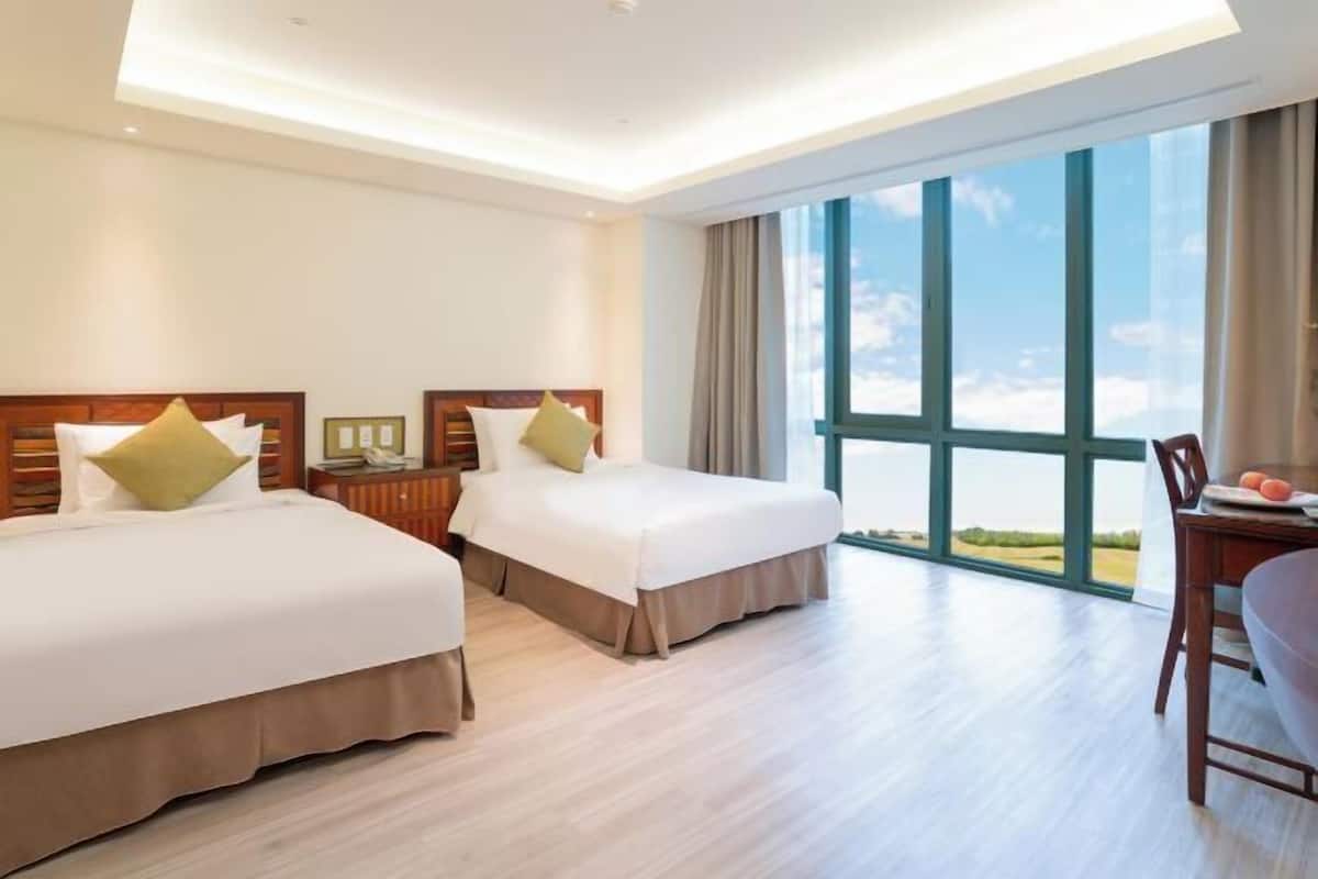 Down comforters, free minibar, in-room safe, desk