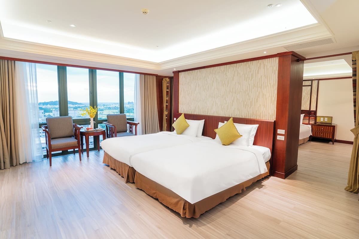 Deluxe Family Room | Down comforters, free minibar, in-room safe, desk
