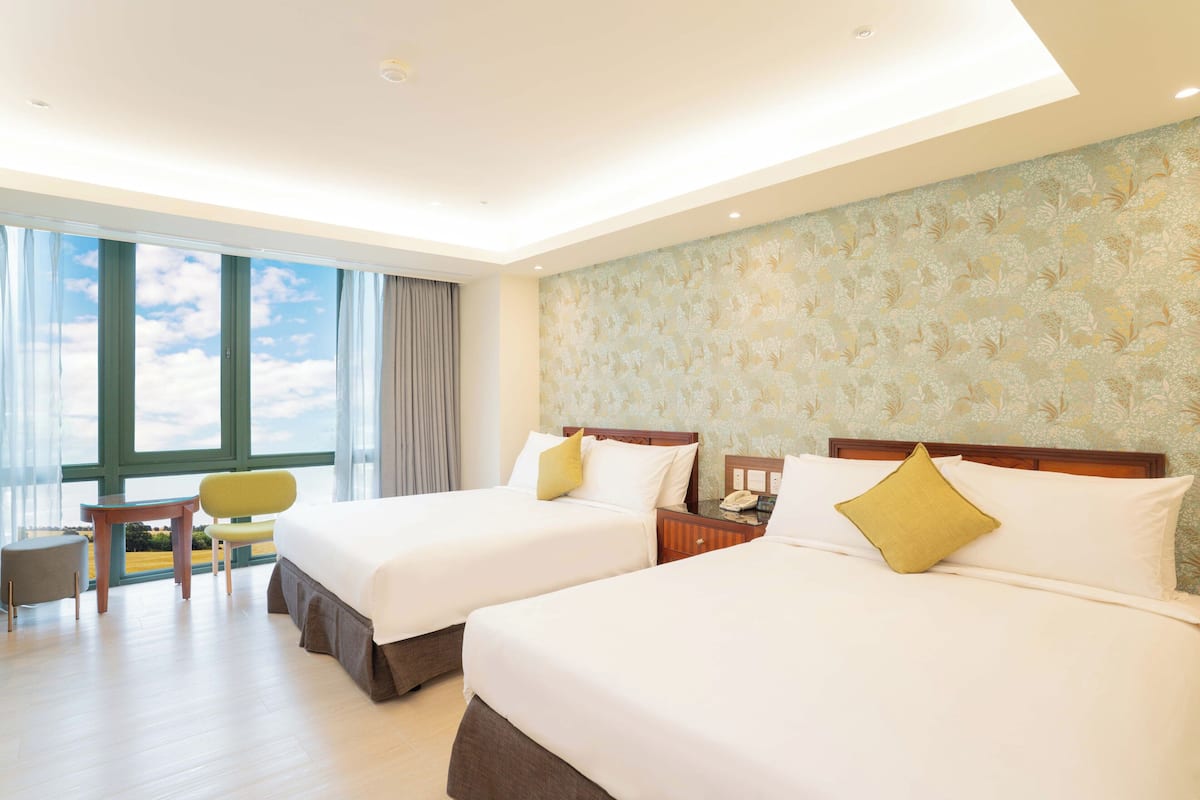Elite Quadruple Room, 2 Double Beds | Down comforters, free minibar, in-room safe, desk