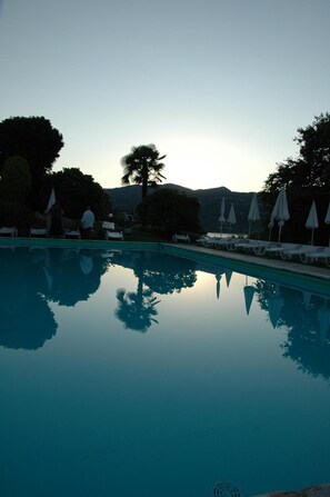 Outdoor pool, pool umbrellas, pool loungers