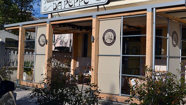 A building with a sign reading "Trattoria DA PEPE Pizzeria". - Hotel Immagine (San Giovanni Rotondo)