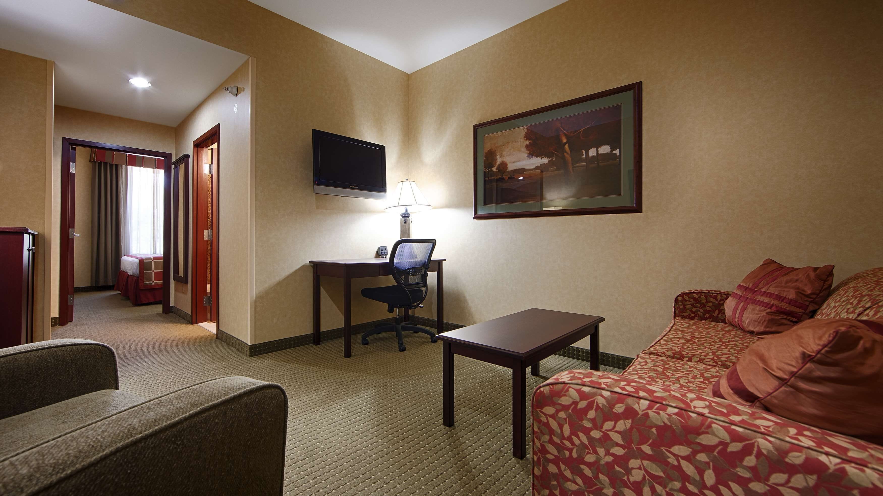 suite, 1 king bed, non smoking, refrigerator & microwave | in-room safe, desk, laptop workspace, blackout curtains