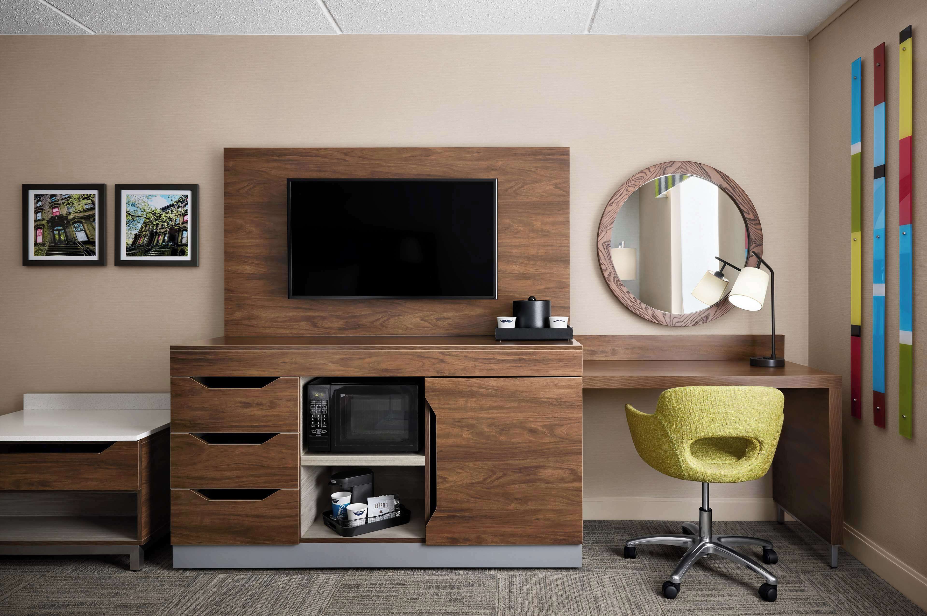 desk, blackout curtains, iron/ironing board, free cots/infant beds