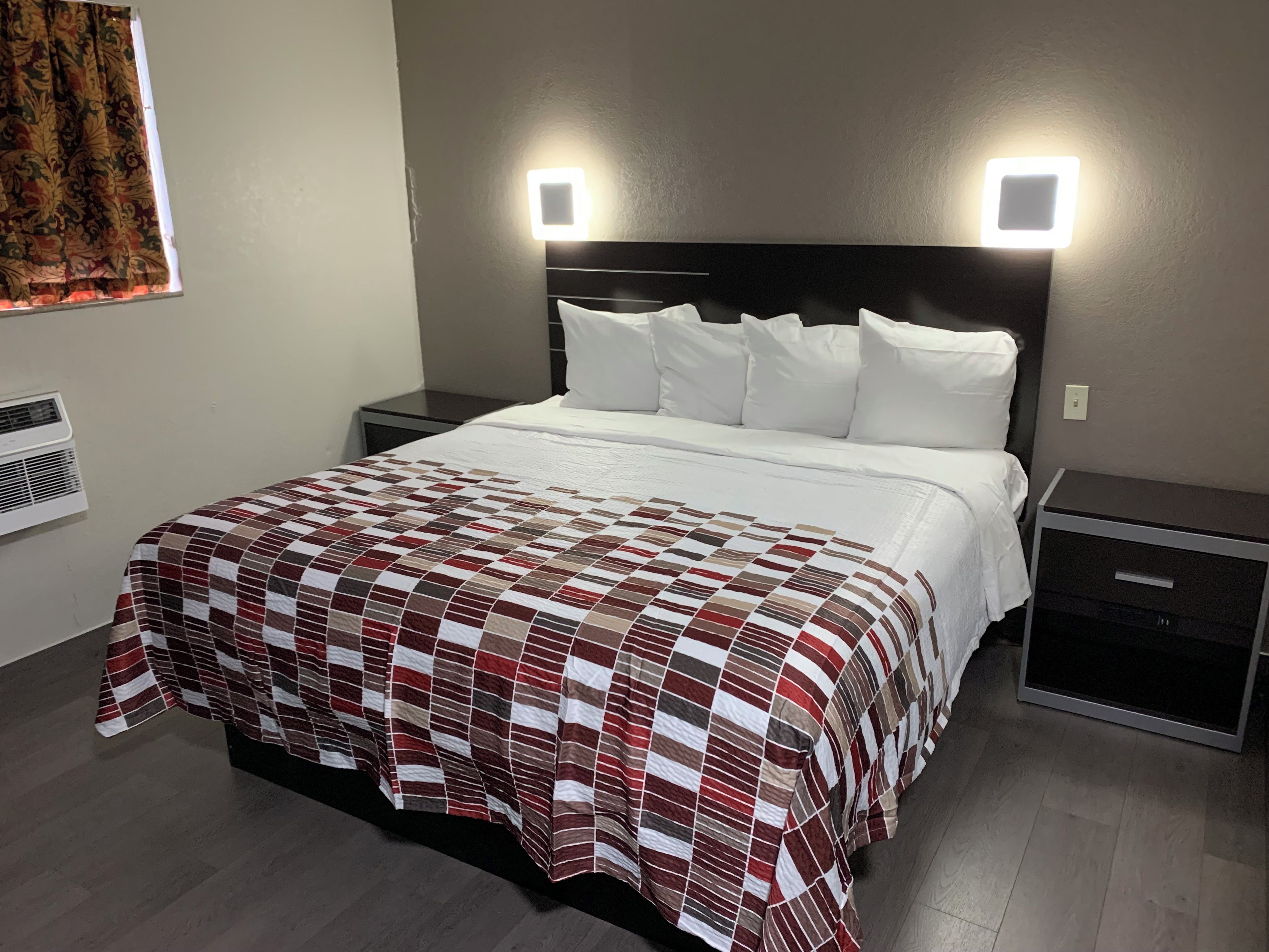 Deluxe Room, 1 King Bed, Accessible, Non Smoking | Desk, laptop workspace, blackout curtains, iron/ironing board