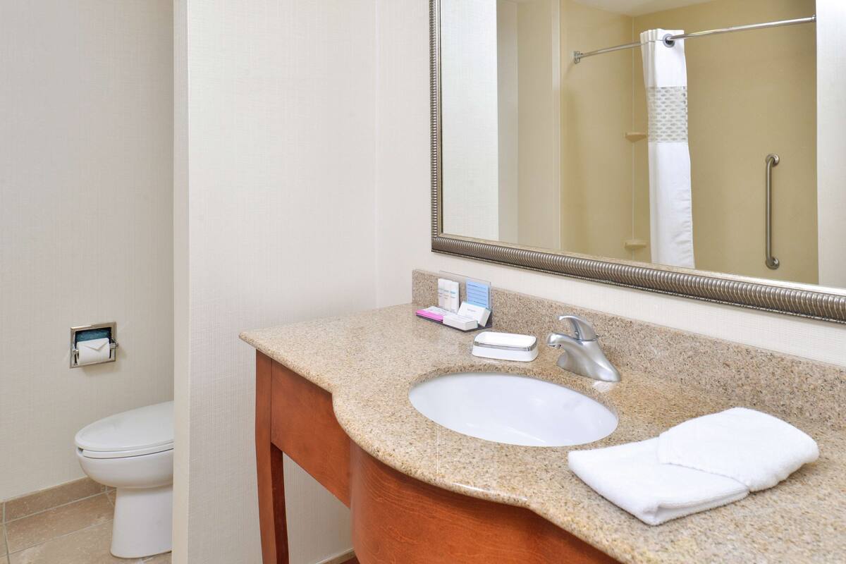 hair dryer, bathrobes, towels