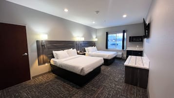 Hypo-allergenic bedding, down duvets, in-room safe