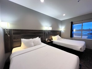 Hypo-allergenic bedding, down duvets, in-room safe